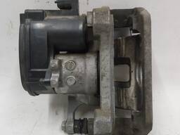 Суппорт тормозной задний левый MANDO без тормозных колодок Tesla model 3 1044623-00-H